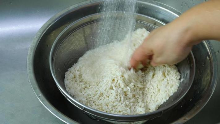 Rinsing basmathi rice image