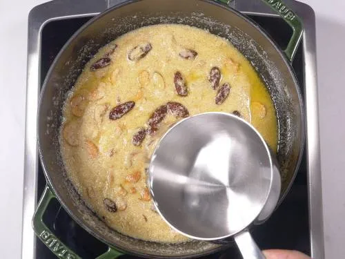 Adding water to semolina