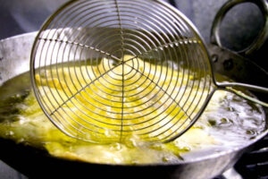 Frying samosa in oil